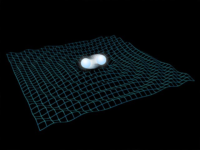 ブラックホール合体で放出された重力波のイメージ。
