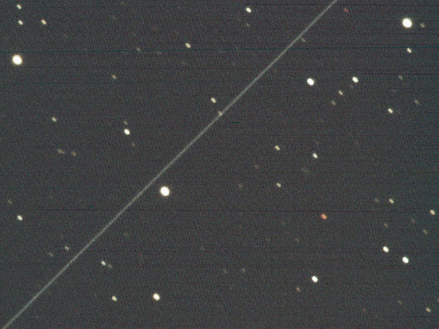 The trail of a Starlink satellite captured by the Murikabushi Telescope on April 10, 2020. 