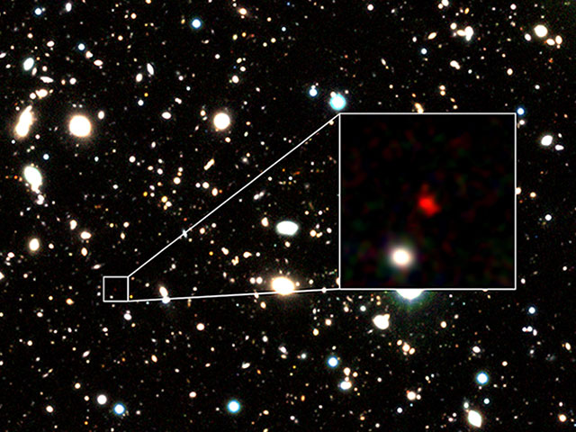 Three-color image of HD1, the most distant galaxy candidate to date, created using data from the VISTA telescope.