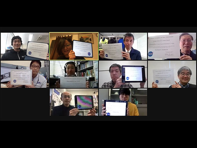Photo: The CLASP2 team members holding their certificates for the NASA/MSFC Group Achievement Honor Award.