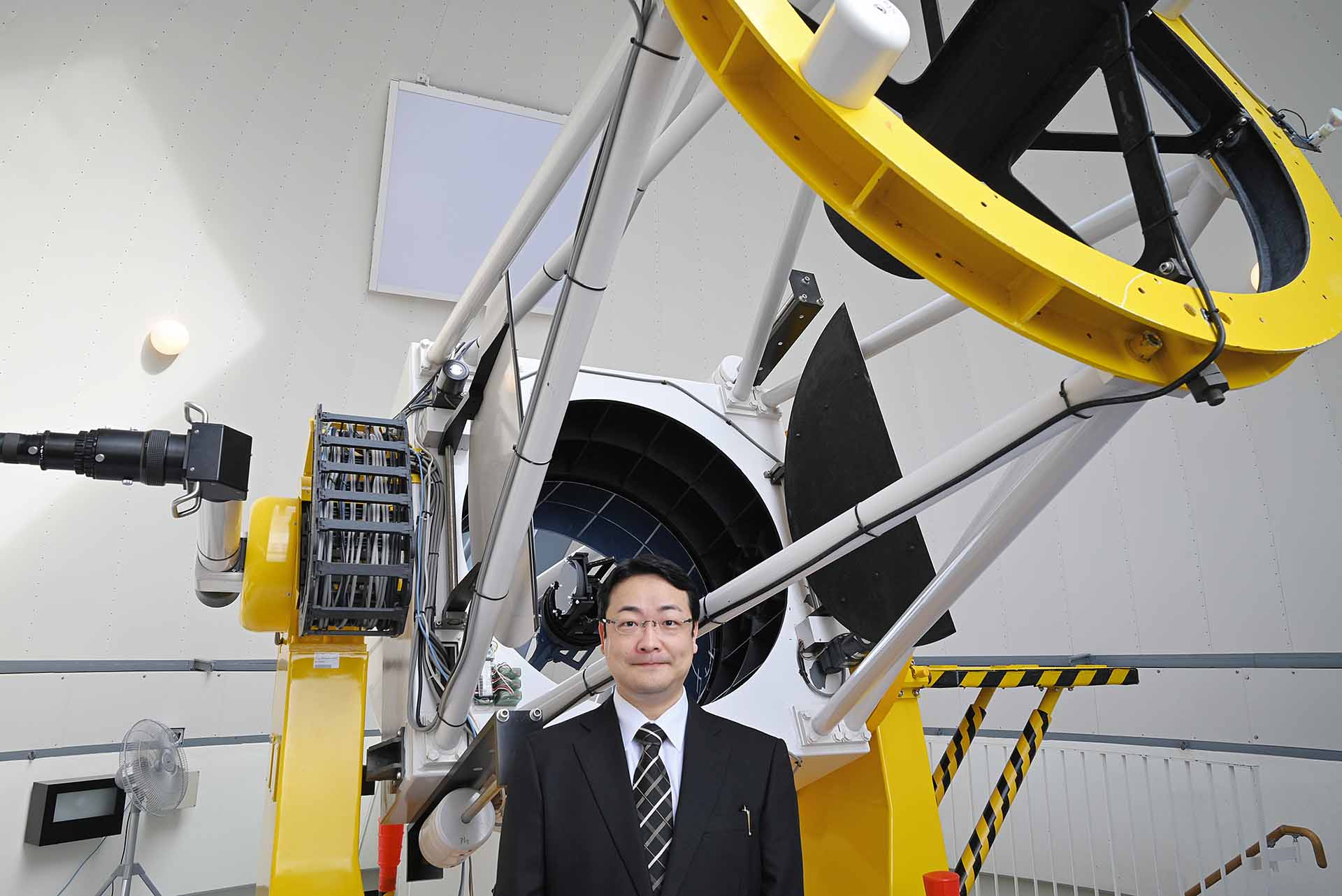 Dr. Hanayama and the Murikabushi Telescope. 