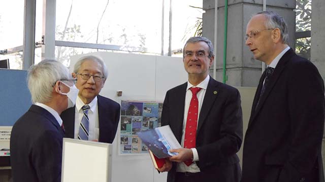 Receiving an overview of ATC. From left to right: ATC Director Hirabayashi, NAOJ Director General Tsuneta, Favata, and de Grijs.