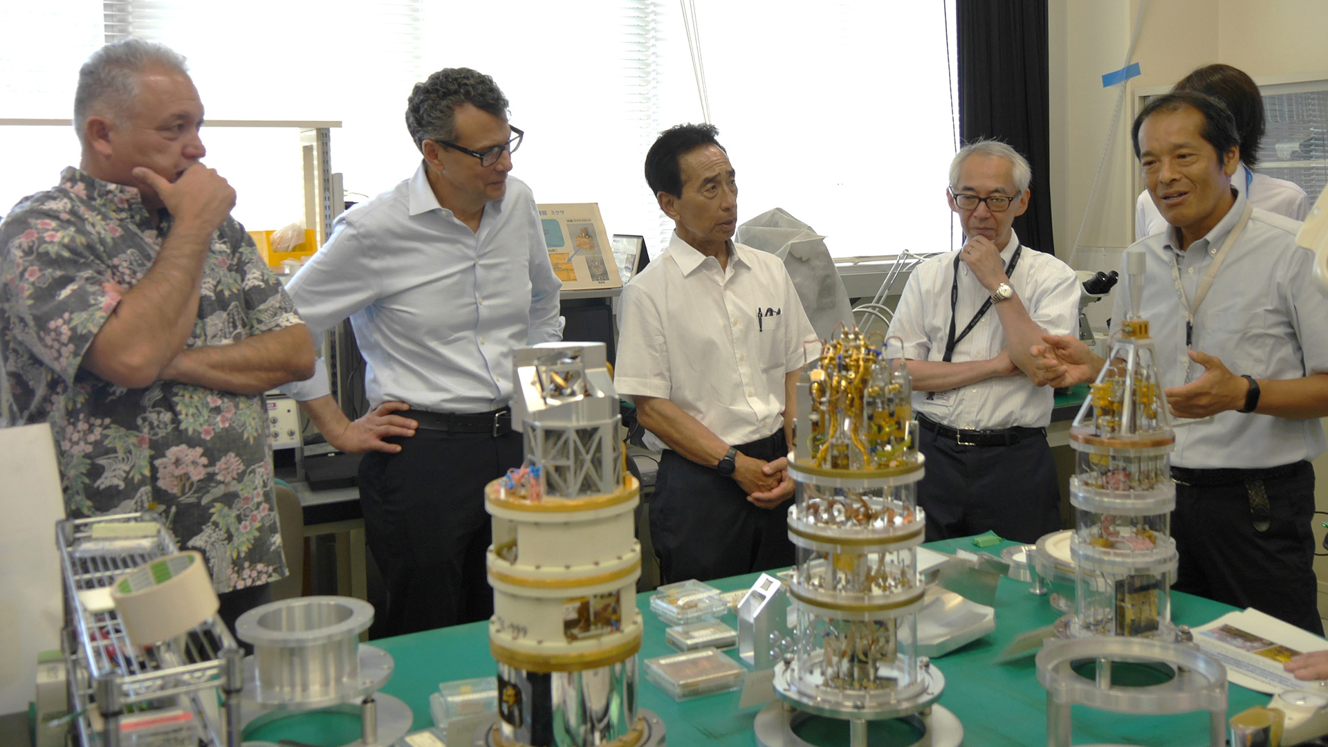 Receiving an explanation about ALMA radio receivers at the Advanced Technology Center.
